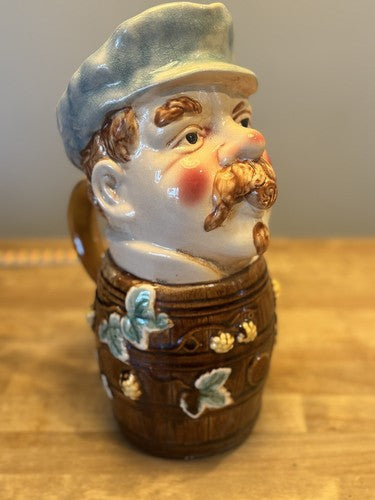 MAJOLICA STYLE PORCELAIN PLANTER VASE MAN IN BARREL W/ GRAPE VINES 10”