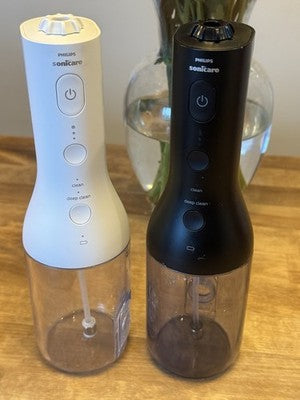 Philips Sonicare Cordless Power Flosser Duo White Black + New Heads Excellent